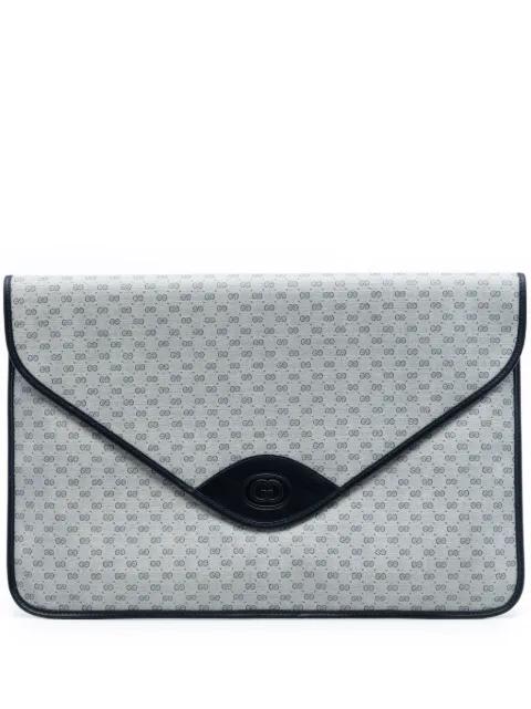 20th Century Micro GG Supreme clutch bag by GUCCI 