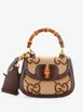 Bamboo 1947 Top Handle Bag Jumbo GG Canvas Mini crossbody bag by GUCCI 