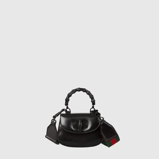 Bamboo mini top handle bag in black leather by GUCCI