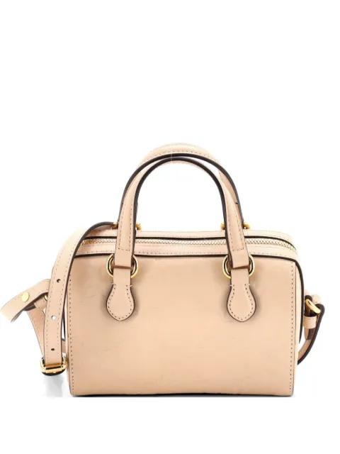 Convertible Boston Bag Jumbo GG Embossed Leather Super Mini crossbody bag by GUCCI 
