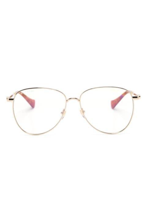 Double G logo-engraved cat-eye frame glasses by GUCCI