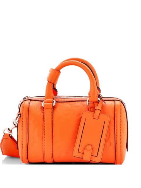 Duffle Bag Jumbo GG Embossed Leather Mini travel bag by GUCCI 