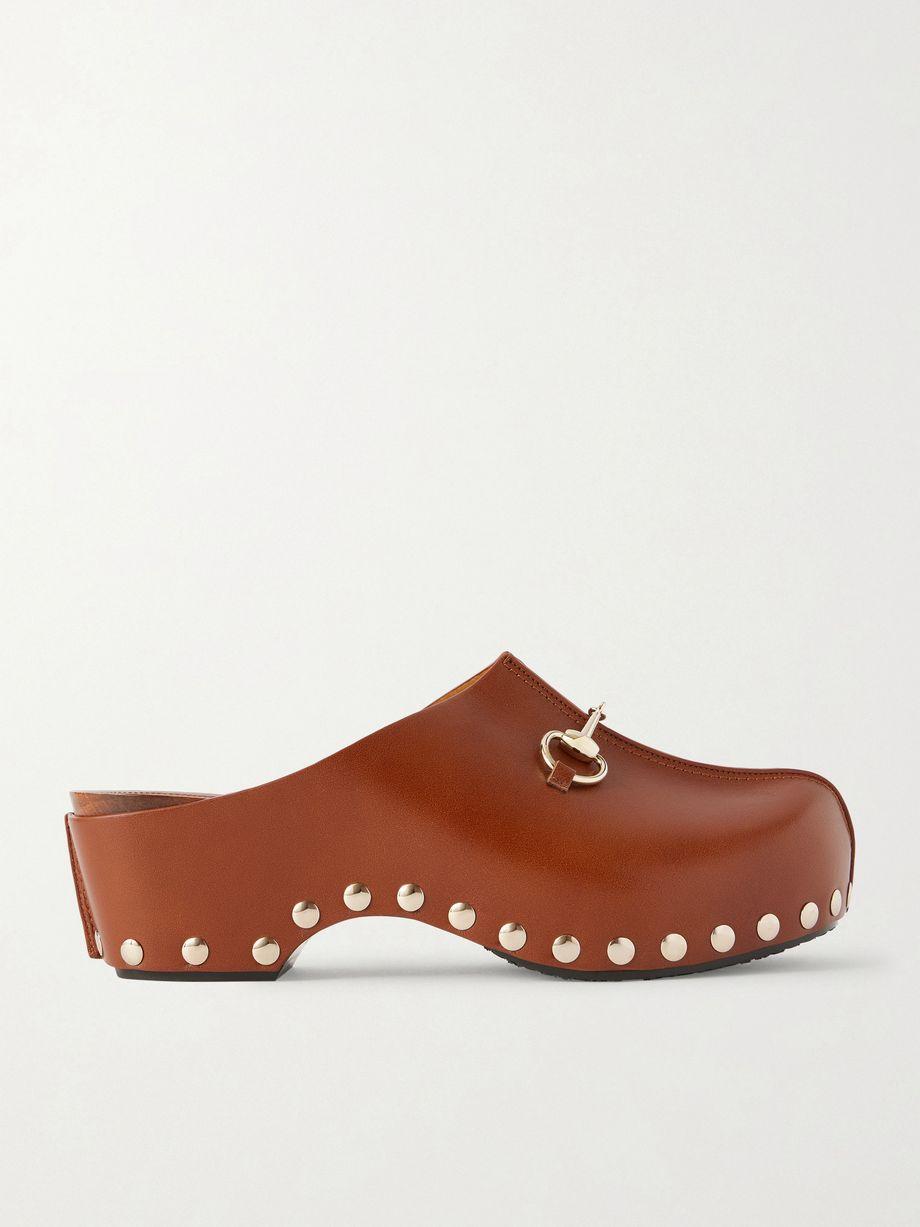 Embellished studded leather clogs by GUCCI