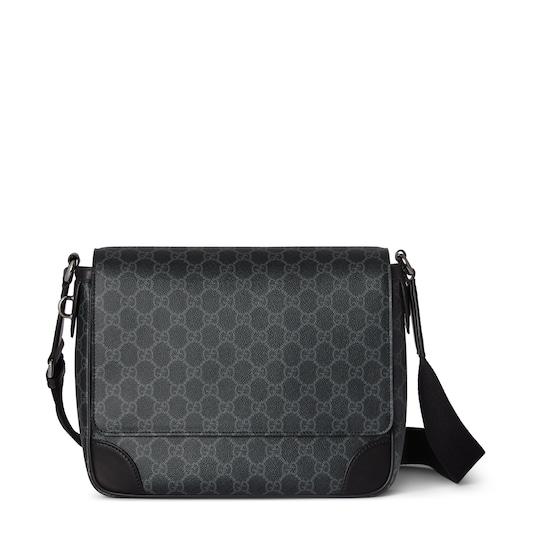 GG Emblem medium crossbody bag in black fabric by GUCCI