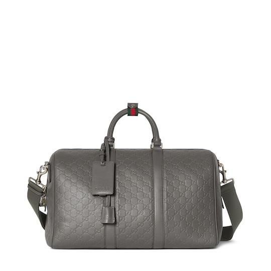 GG Emblem medium duffle bag by GUCCI