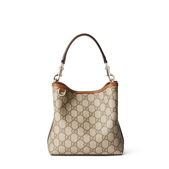 GG Emblem mini bucket bag in beige and dark brown canvas by GUCCI