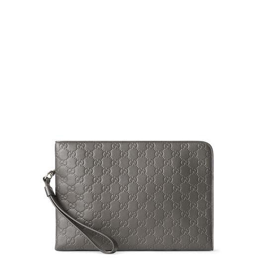 GG Emblem pouch by GUCCI