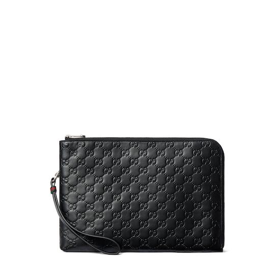 GG Emblem pouch by GUCCI