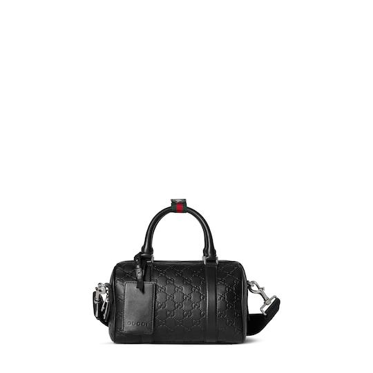 GG Emblem small duffle bag by GUCCI