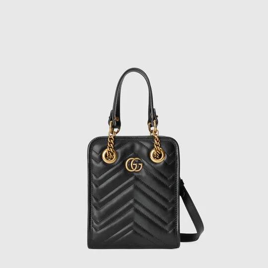 GG Marmont matelassé mini bag in black leather by GUCCI