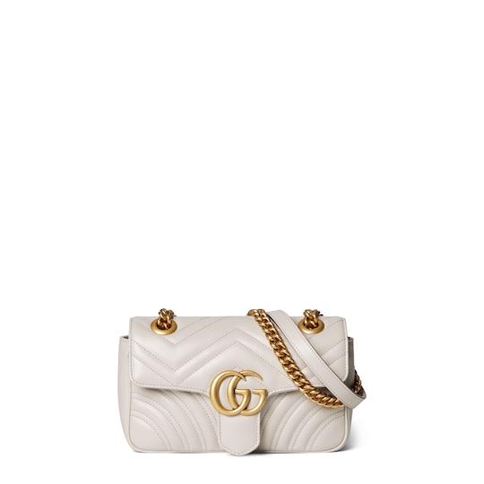 GG Marmont matelassé mini bag in light beige leather by GUCCI