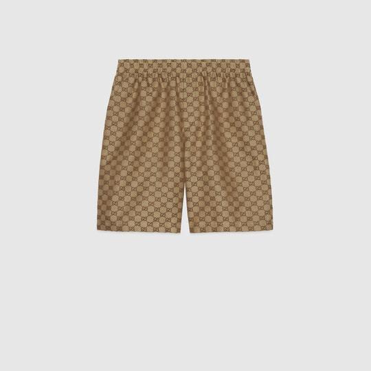 GG Supreme linen shorts in beige and ebony by GUCCI