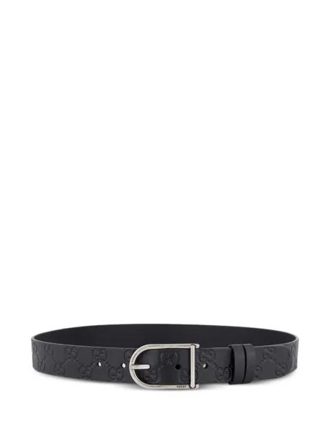 GG-debossed buckle leather belt by GUCCI