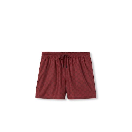GG print nylon swim short in bordeaux by GUCCI
