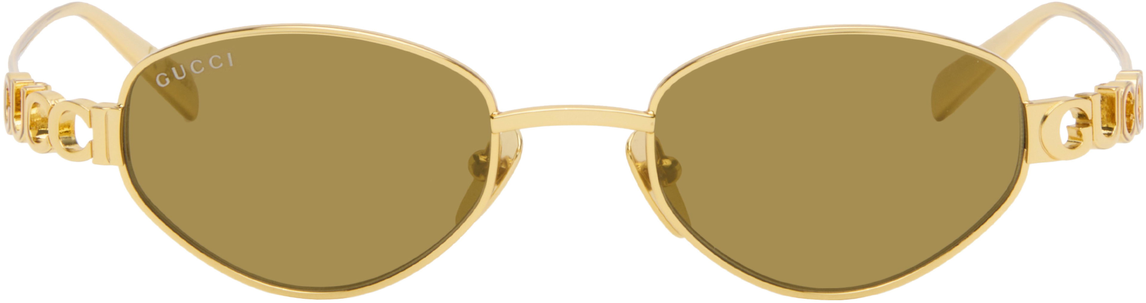 Gold Oval Frame Sunglasses by GUCCI