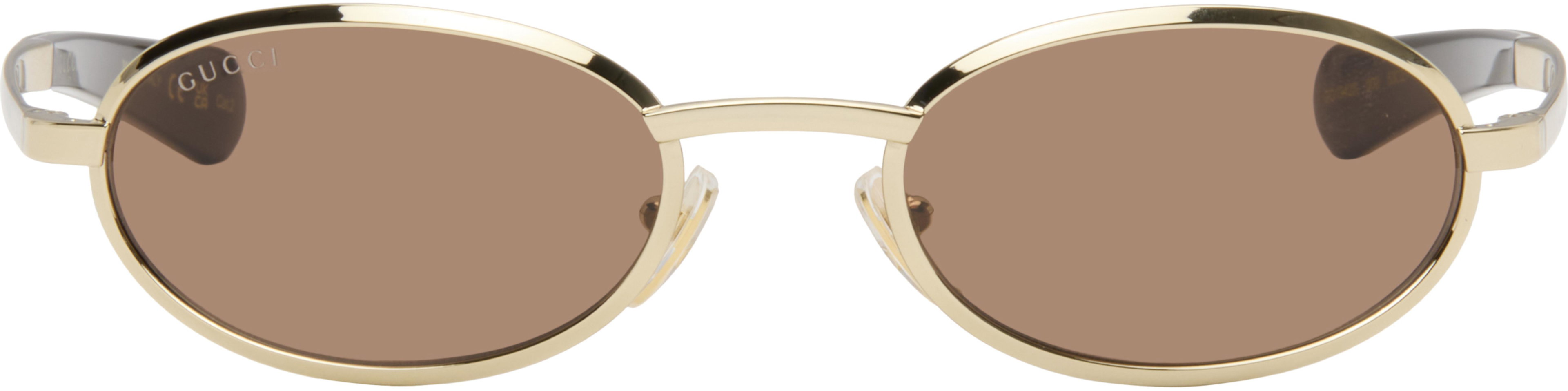Gold Oval Frame Sunglasses by GUCCI