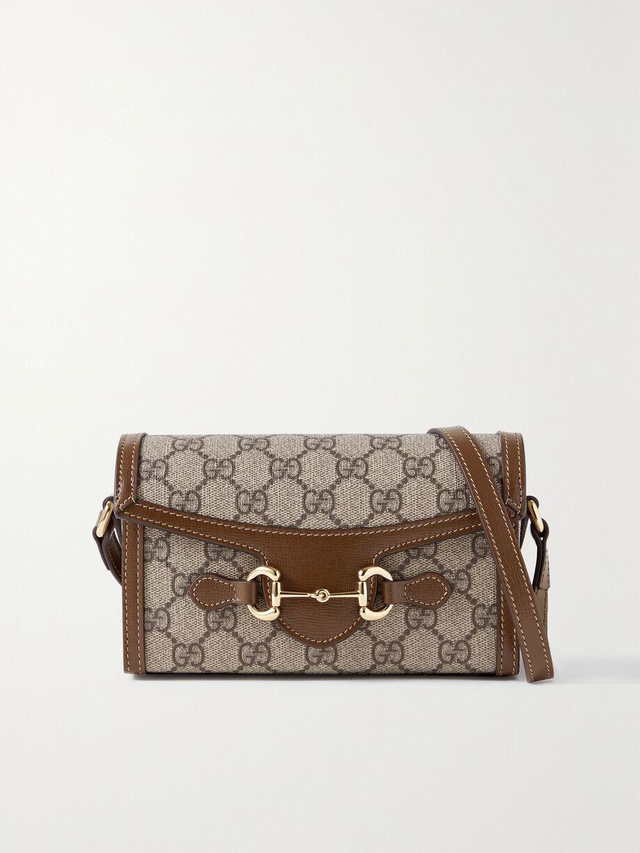 Horsebit 1955 leather-trimmed printed coated-canvas shoulder bag by GUCCI