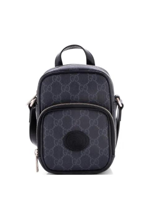 Interlocking G Patch Top Handle GG Coated Canvas Mini crossbody bag by GUCCI 