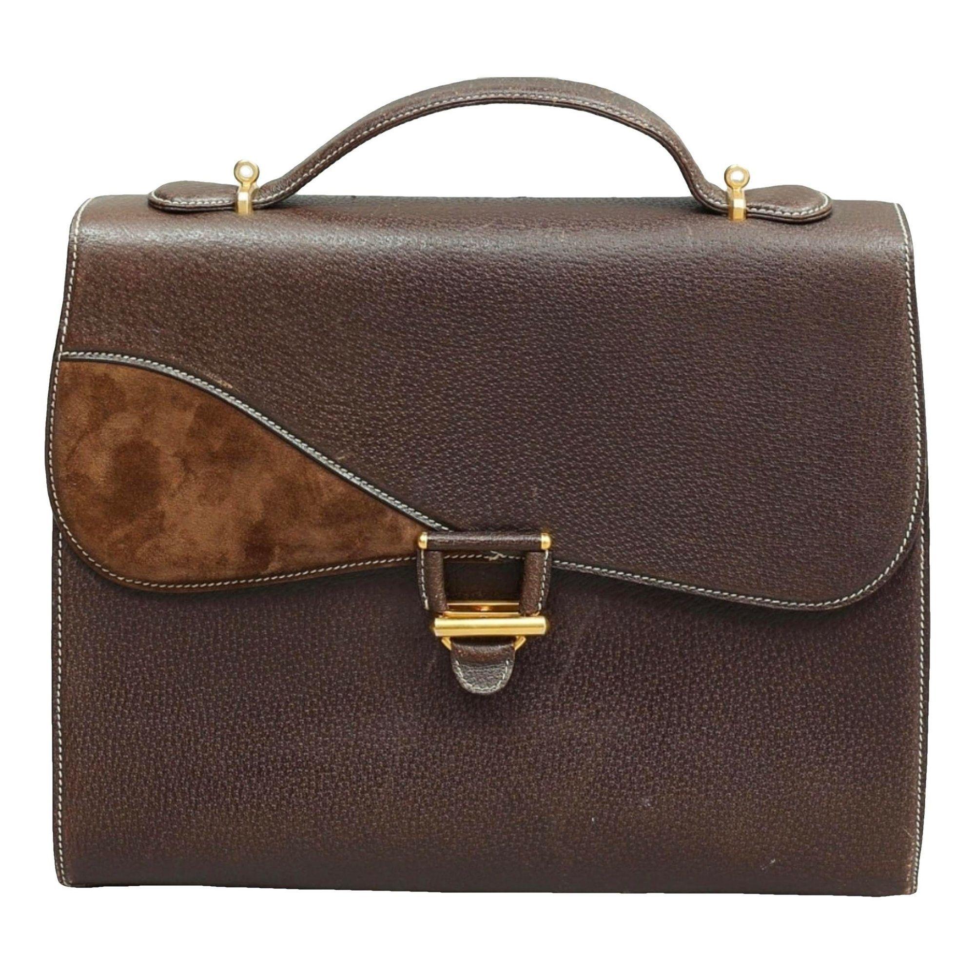 Jackie leather handbag by GUCCI