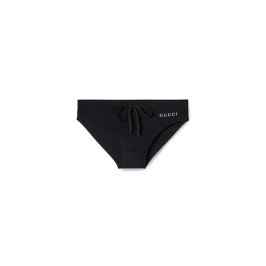Lycra swim briefs with print in black by GUCCI
