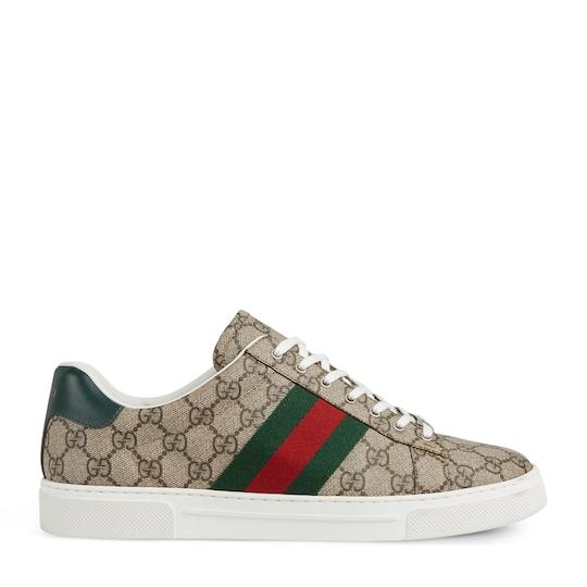 Men's Gucci Ace sneaker with Web in beige and ebony GG Supreme by GUCCI