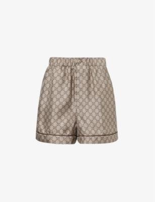 Monogram-pattern high-rise silk shorts by GUCCI