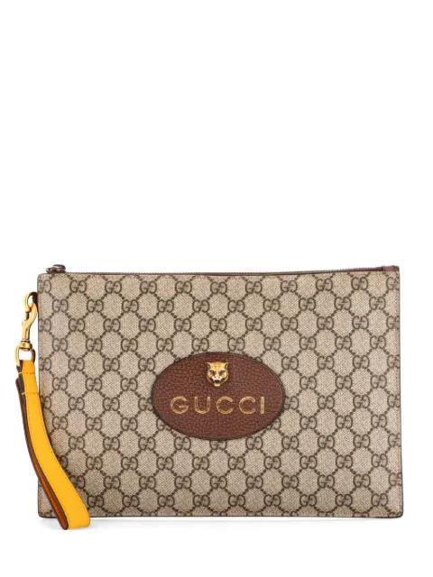 Neo Vintage Wristlet Pouch GG Coated Canvas clutch bag by GUCCI 