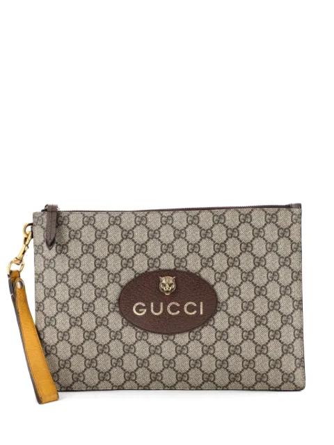 Neo Vintage Wristlet Pouch GG Coated Canvas clutch bag by GUCCI 