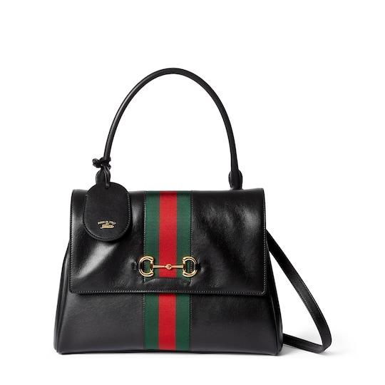 Paparazzo medium top handle bag by GUCCI
