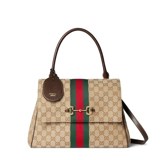 Paparazzo medium top handle bag by GUCCI