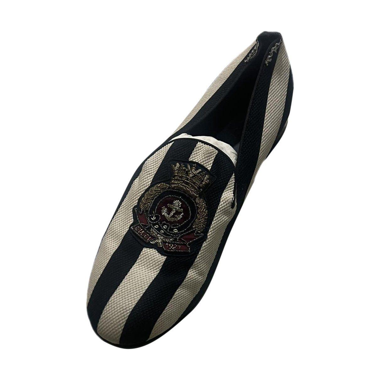 Queercore leather lace ups by GUCCI