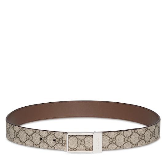 Reversible belt with rectangular buckle in beige GG Supreme and brown leather by GUCCI