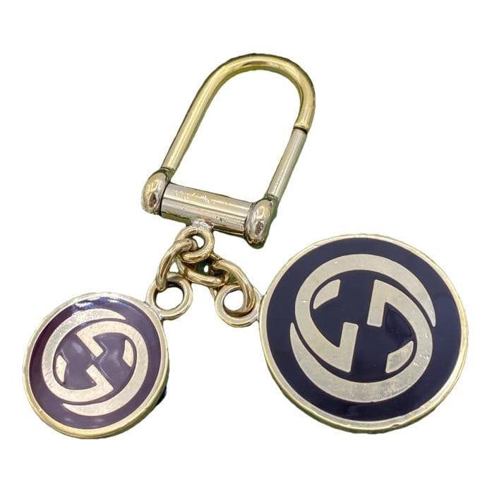 Silver bag charm by GUCCI