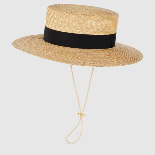 Straw boater hat in beige by GUCCI