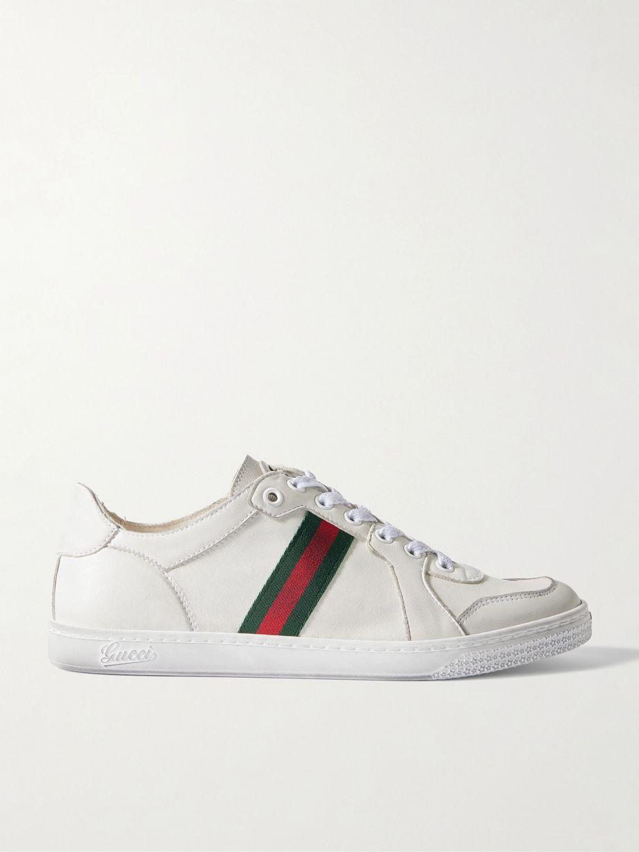 Stretch distressed webbing-trimmed leather sneakers by GUCCI