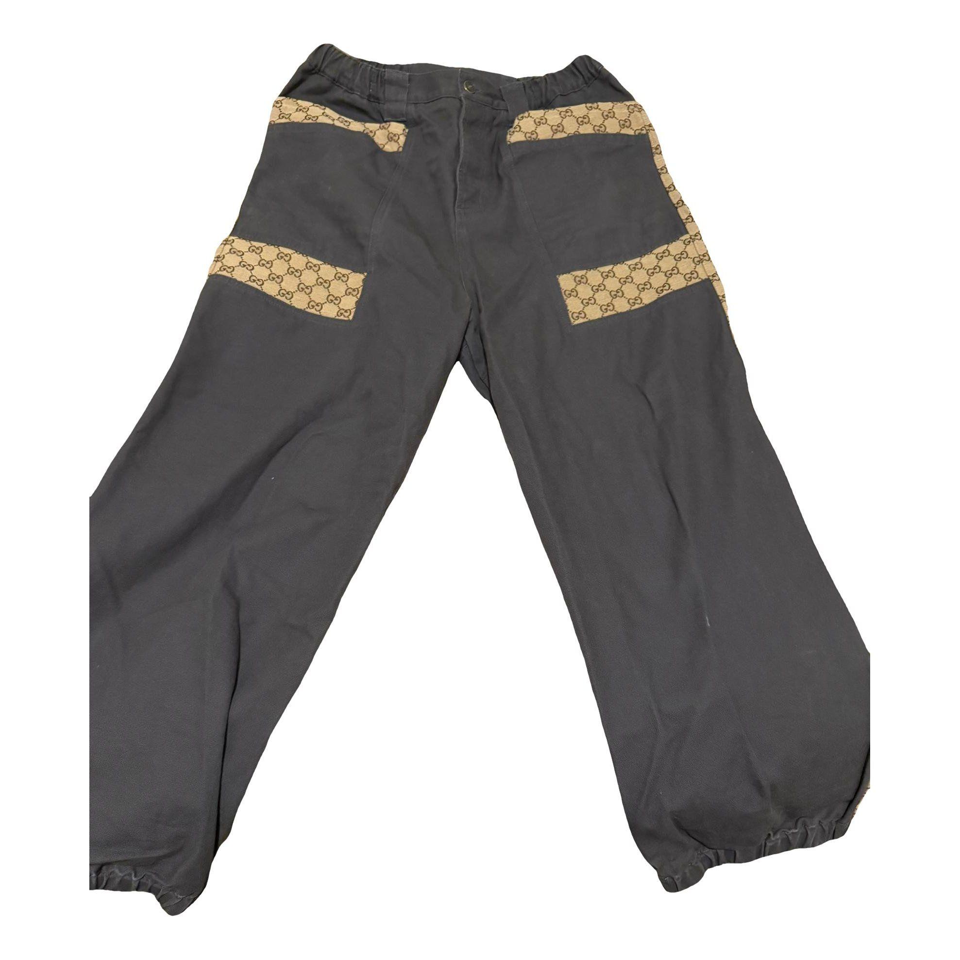 Trousers by GUCCI Trousers by GUCCI