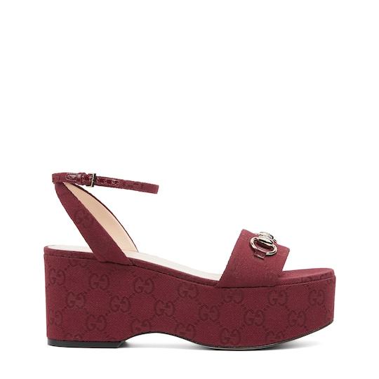 Women's Horsebit flatform sandal in Rosso Ancora red GG canvas by GUCCI