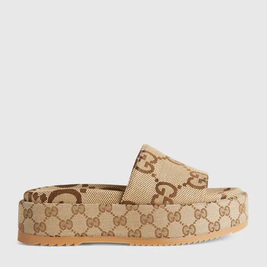 Women's platform slide sandal in camel and ebony maxi GG canvas by GUCCI