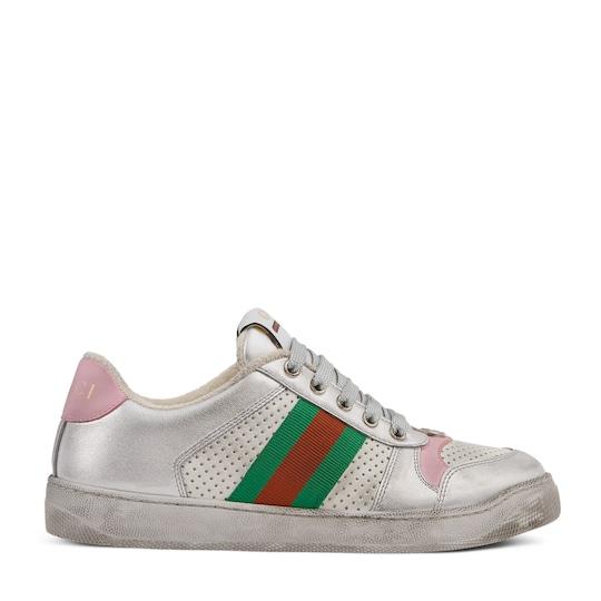 Women's worn-out effect Screener sneaker by GUCCI