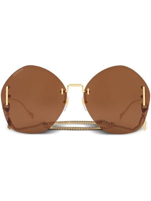 frameless logo-engraved sunglasses by GUCCI