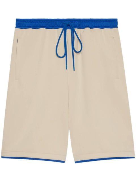logo-appliqué scuba track shorts by GUCCI