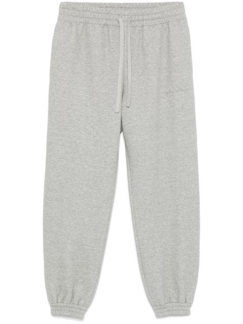 logo-embossed track pants by GUCCI