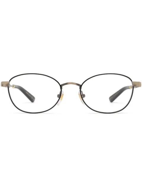 oval-frame glasses by GUCCI
