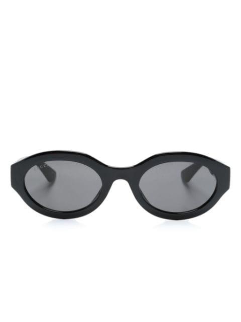 oval-frame sunglasses by GUCCI