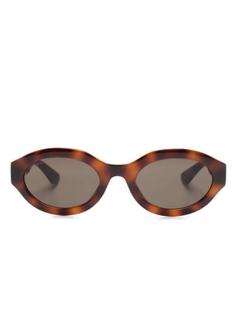 oval-frame sunglasses by GUCCI