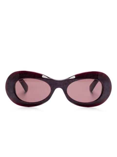 oval-frame sunglasses by GUCCI