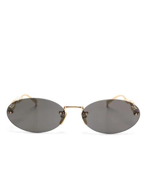 oval-frame sunglasses by GUCCI