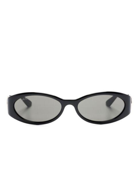 oval-frame sunglasses by GUCCI