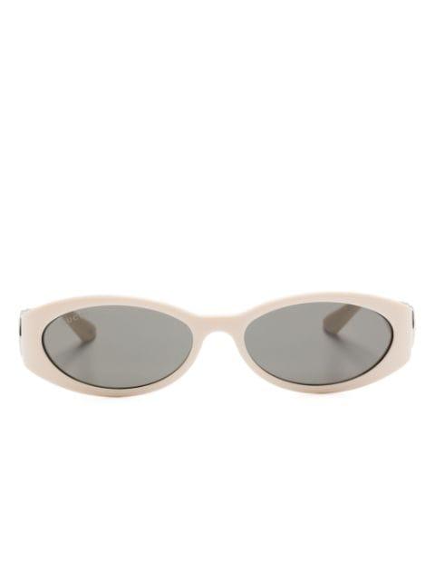 oval-frame tinted-lenses sunglasses by GUCCI