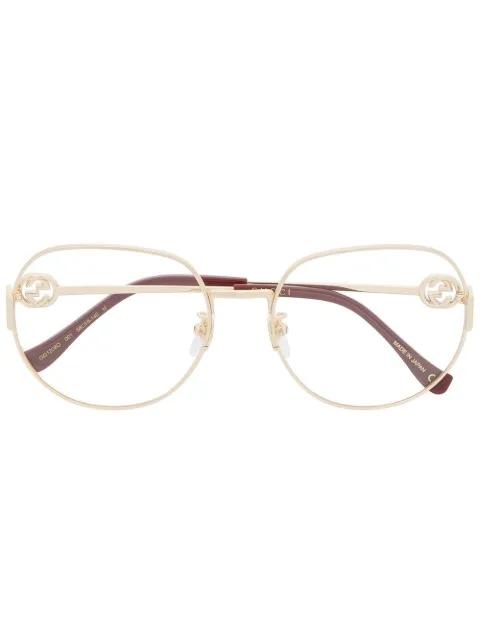 oversized round-frame glasses by GUCCI